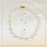 Edles Geschenkset: Silber-Blaues Brokattäschchen & Aquamarin-Kette mit Topas-Energie