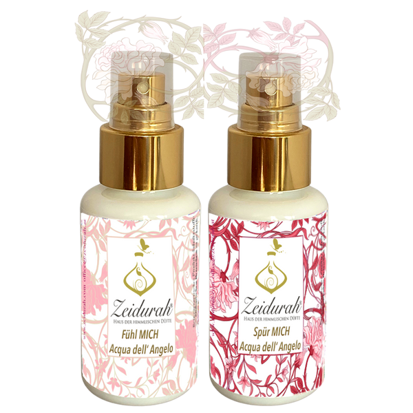 "Zartes Duftset mit zwei Aura Sprays – FÜHL MICH & SPÜR MICH – in liebevoll gestalteten Flakons, eingebettet in florale Illustrationen. Inspiriert von Pflanzen wie Vetiver, Rose, Tuberose & Wiesenkönigin – für innere Harmonie, emotionale Öffnung und fühlbare Verbindung.“